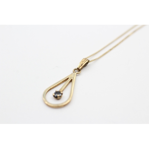 188 - 9ct gold sapphire pendant on chain (1.4g)