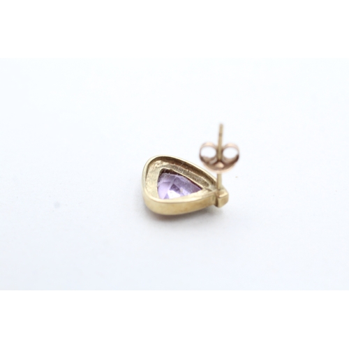 192 - 9ct gold trilliant cut amethyst and diamond set stud earrings (2.7g)