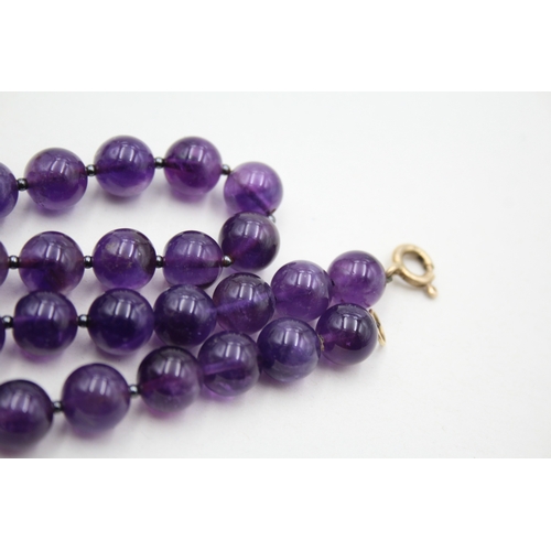 196 - 9ct gold amethyst beaded necklace (53.2g)