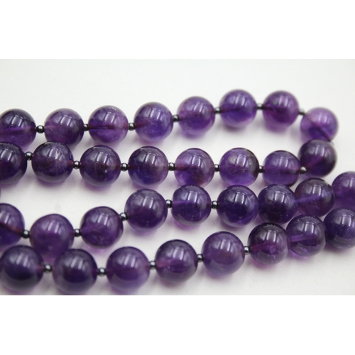 196 - 9ct gold amethyst beaded necklace (53.2g)