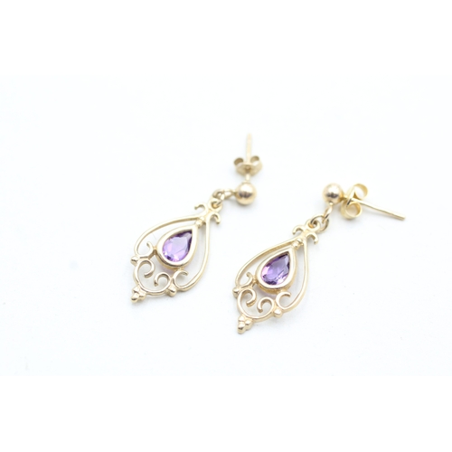 197 - 9ct gold pear cut amethyst set drop earrings (1.6g)