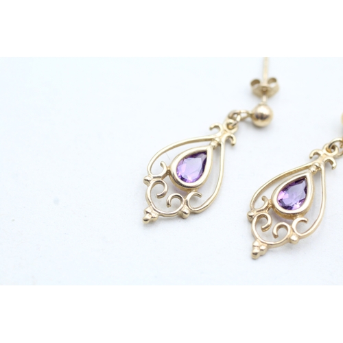 197 - 9ct gold pear cut amethyst set drop earrings (1.6g)