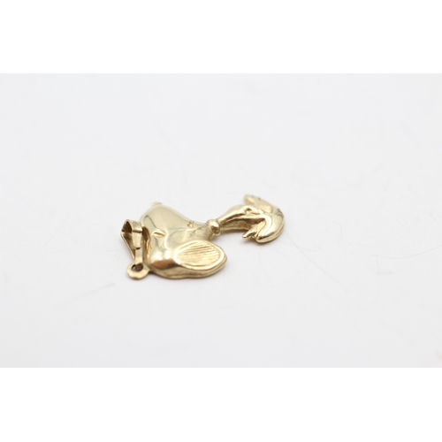 206 - 9ct gold snoopy charm (0.7g)