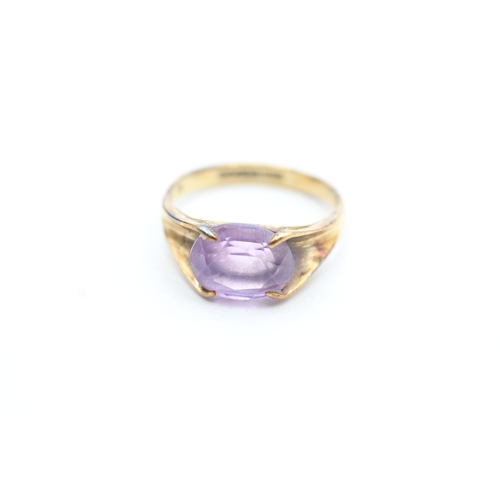 208 - 9ct gold oval cut amethyst dress ring (2.7g) Size N