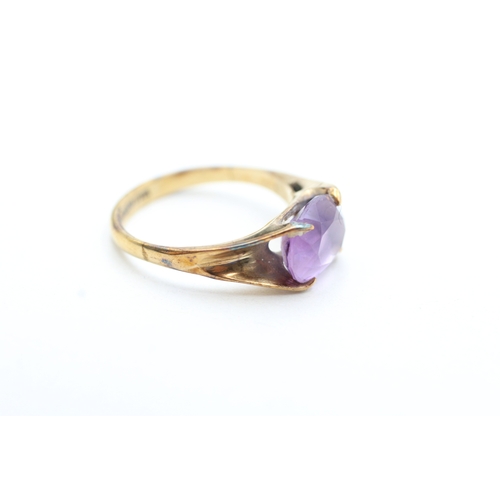 208 - 9ct gold oval cut amethyst dress ring (2.7g) Size N