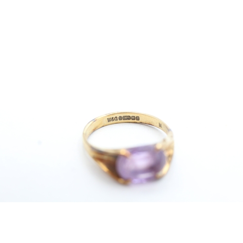 208 - 9ct gold oval cut amethyst dress ring (2.7g) Size N