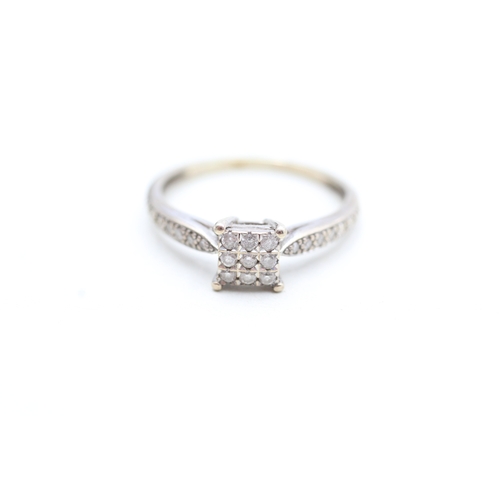 210 - 9ct gold diamond dress ring (2.2g) Size R