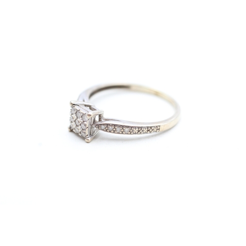 210 - 9ct gold diamond dress ring (2.2g) Size R