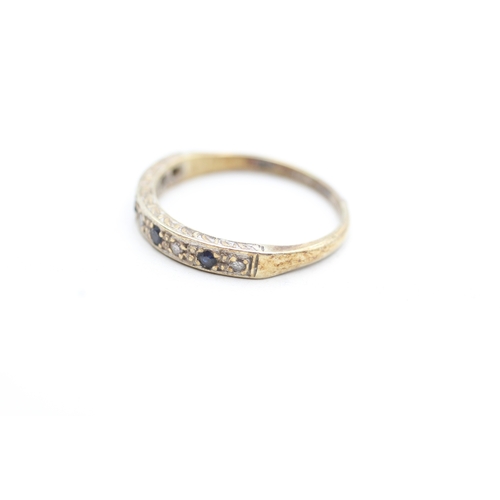 213 - 9ct gold diamond and sapphire set eternity ring (2.6g) Size R