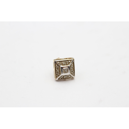 214 - 9ct gold diamond stud earrings (1.4g)