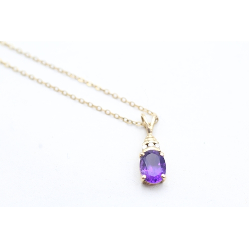 215 - 9ct gold diamond accented amethyst set pendant necklace (2g)