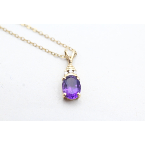 215 - 9ct gold diamond accented amethyst set pendant necklace (2g)