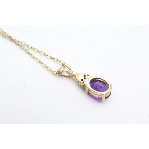 215 - 9ct gold diamond accented amethyst set pendant necklace (2g)