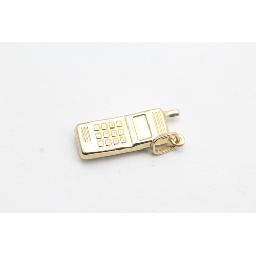 222 - 9ct gold mobile phone charm (0.8g)