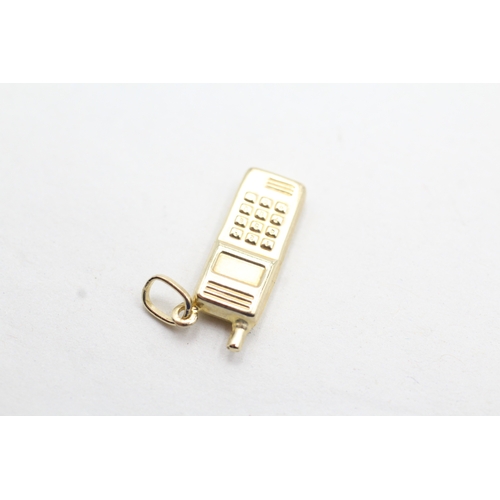 222 - 9ct gold mobile phone charm (0.8g)