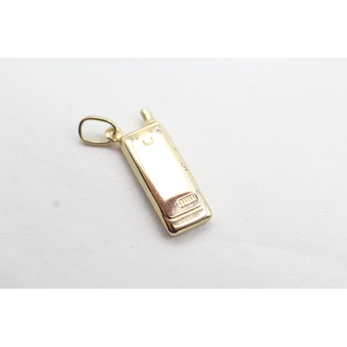 222 - 9ct gold mobile phone charm (0.8g)