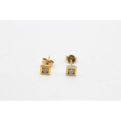 231 - 9ct gold diamond single stone stud earrings (0.5g)