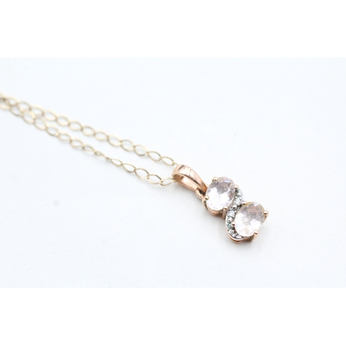 232 - 9ct gold diamond & morganite twin stone pendant on chain (2.2g)