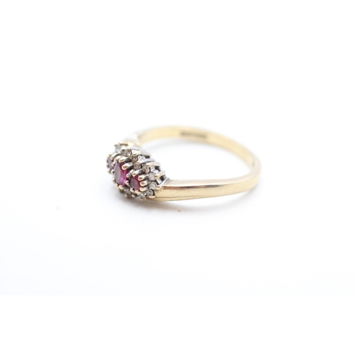 233 - 9ct gold ruby & diamond dress ring (2.9g) Size N