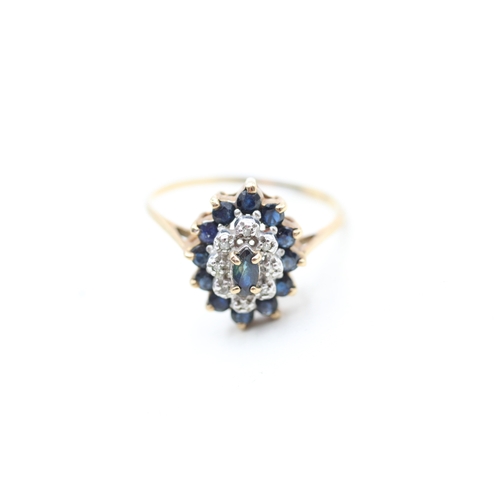 241 - 9ct gold diamond and sapphire set cluster ring (2.2g) Size R