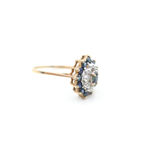 241 - 9ct gold diamond and sapphire set cluster ring (2.2g) Size R