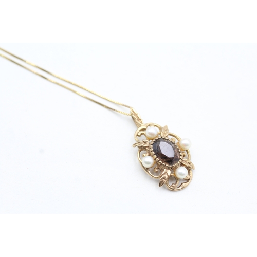 242 - 9ct gold smokey quartz and cultured pearl pendant on chain (3g)