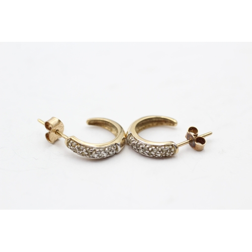 243 - 9ct gold diamond half hoop earrings (1.6g)