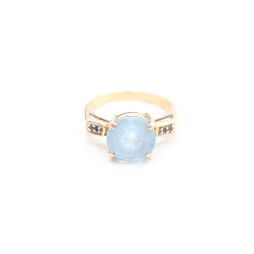 244 - 9ct gold blue and white gemstone set dress ring (4.1g) Size N