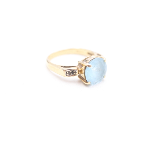 244 - 9ct gold blue and white gemstone set dress ring (4.1g) Size N