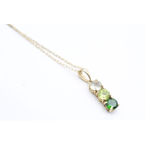 26 - 9ct gold diopside, citrine and peridot pendant on chain (1.6g)