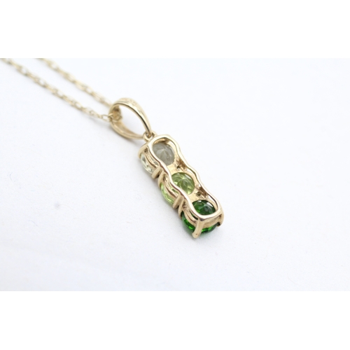 26 - 9ct gold diopside, citrine and peridot pendant on chain (1.6g)