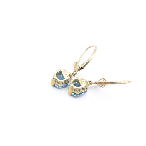 30 - 9ct gold blue topaz drop earrings with lever backs (2.1g)