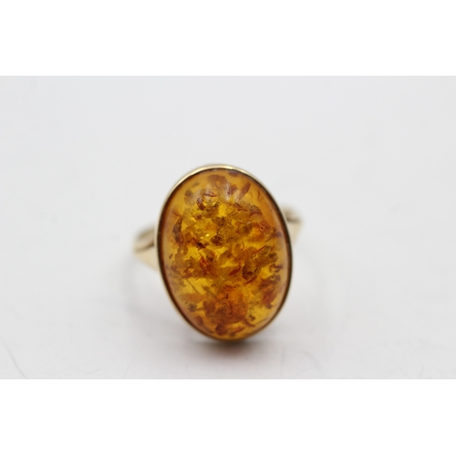 36 - 9ct gold amber single stone ring (3.1g) Size N