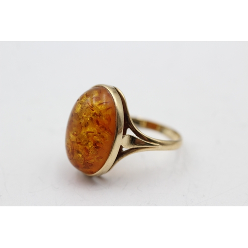 36 - 9ct gold amber single stone ring (3.1g) Size N