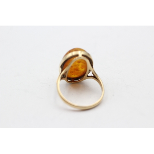 36 - 9ct gold amber single stone ring (3.1g) Size N