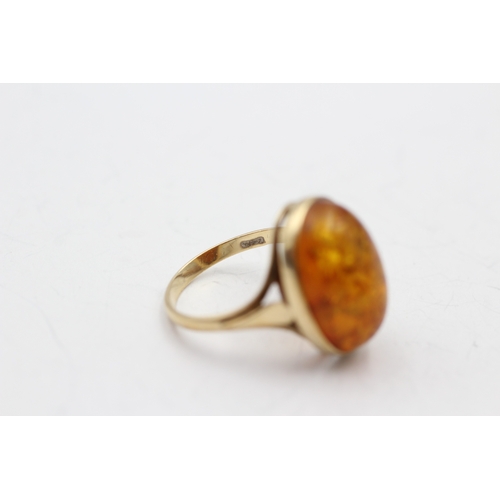 36 - 9ct gold amber single stone ring (3.1g) Size N