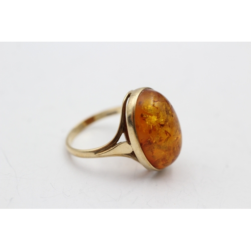 36 - 9ct gold amber single stone ring (3.1g) Size N