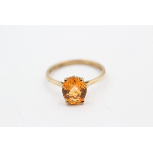 41 - 9ct gold orange gemstone single stone ring (2.4g) Size S