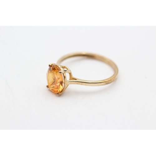 41 - 9ct gold orange gemstone single stone ring (2.4g) Size S