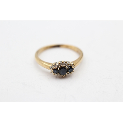 49 - 9ct gold sapphire and diamond trilogy halo ring (2.4g) Size P