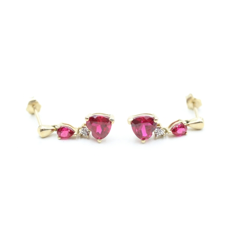 51 - 9ct gold diamond and red gemstone heart drop earrings (1.8g)