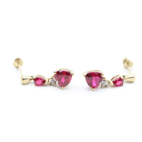 51 - 9ct gold diamond and red gemstone heart drop earrings (1.8g)