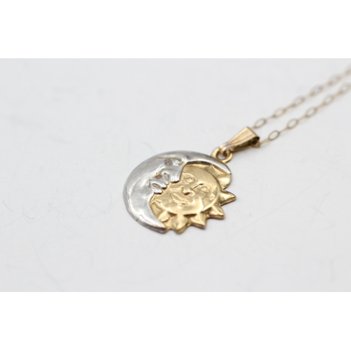 52 - 9ct gold sun and moon pendant on chain (0.6g)