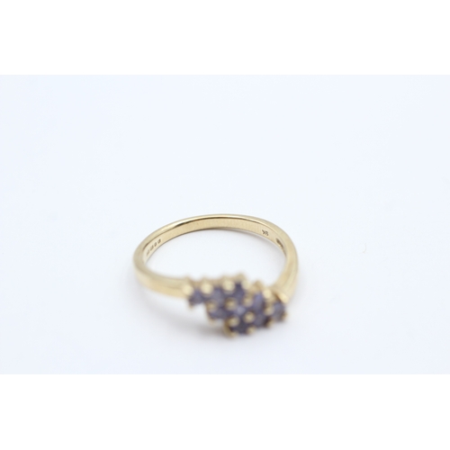 55 - 9ct gold tanzanite three row ring (2.4g) Size N