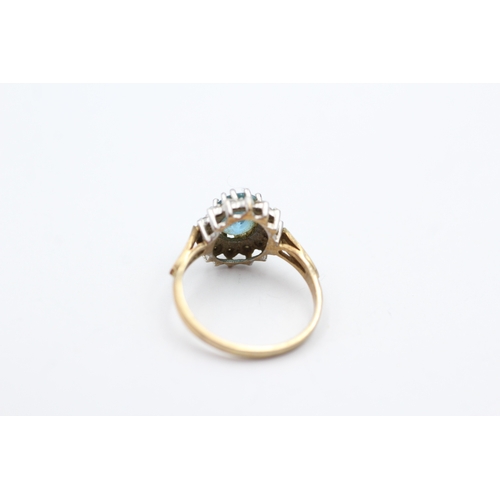 58 - 9ct gold topaz and diamond halo ring (2.1g) Size K