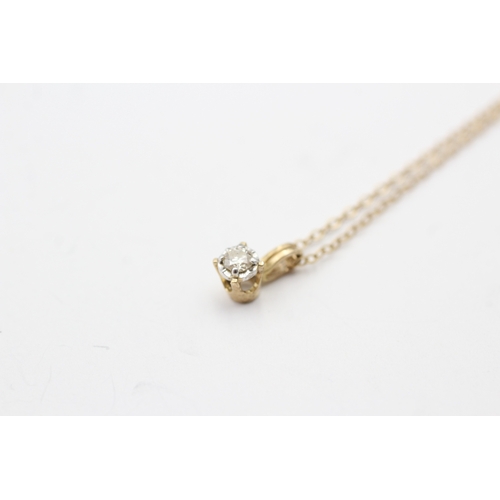 70 - 9ct gold diamond single stone pendant on chain (1.4g)