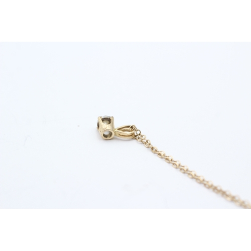 70 - 9ct gold diamond single stone pendant on chain (1.4g)