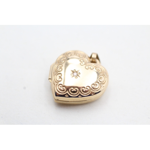 75 - 9ct gold diamond patterned heart shape locket (1.9g)