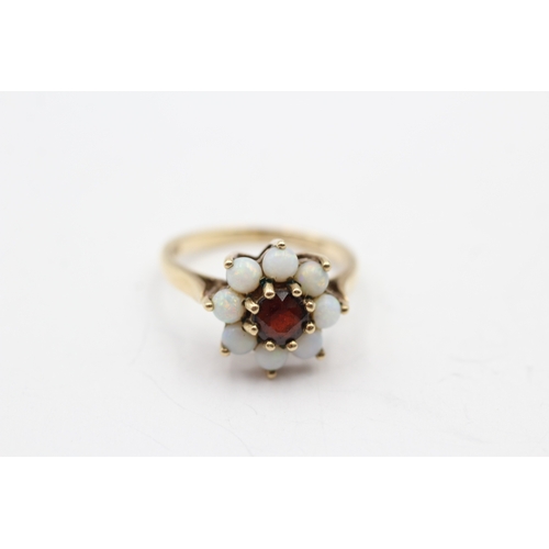 80 - 9ct gold opal and garnet halo ring (2.7g) Size M