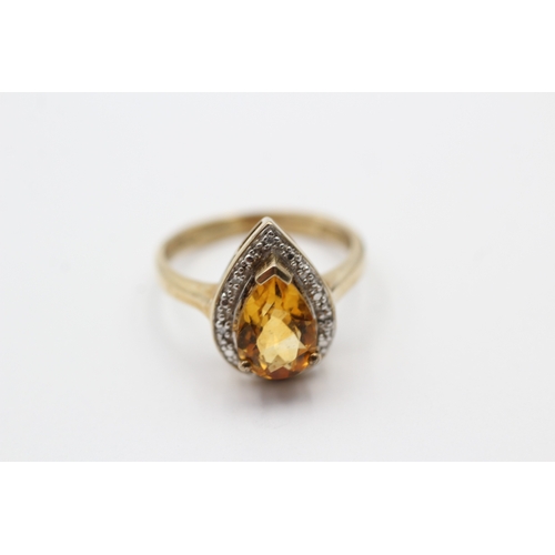 86 - 9ct gold cirtine and diamond pear halo gemstone ring (3.5g) Size P